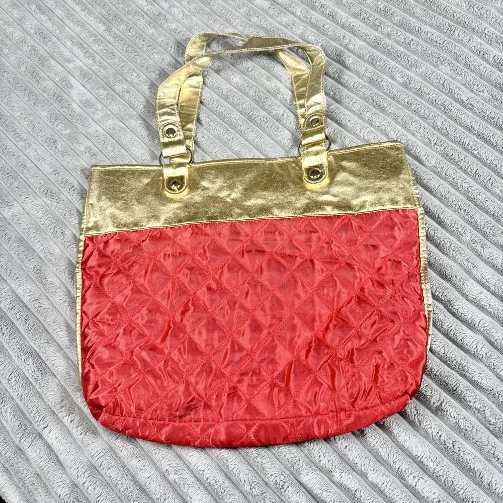 Women's red quilted tote bag with gold trim trimming‎